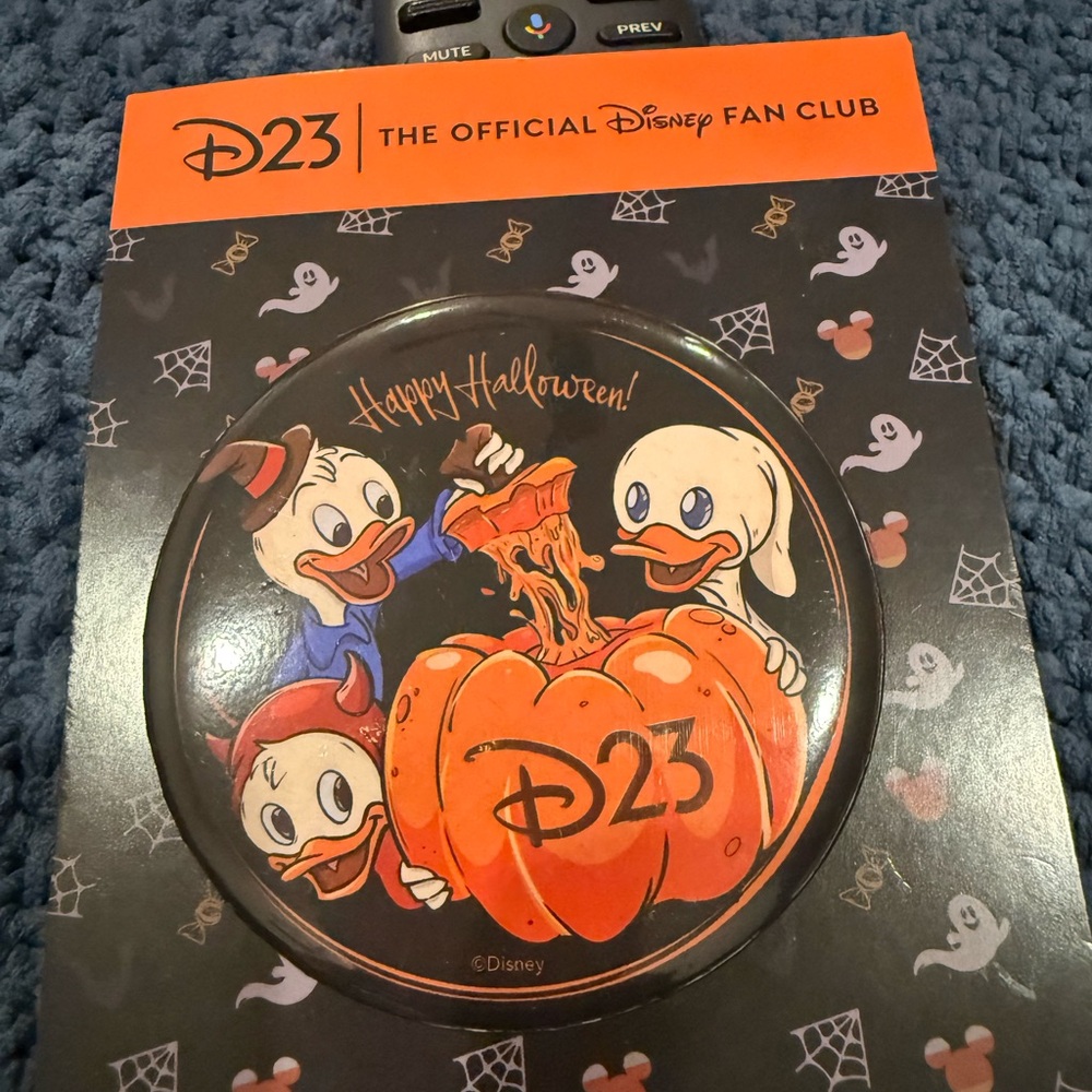 Disney D23 Halloween Pin with Orange and White Design